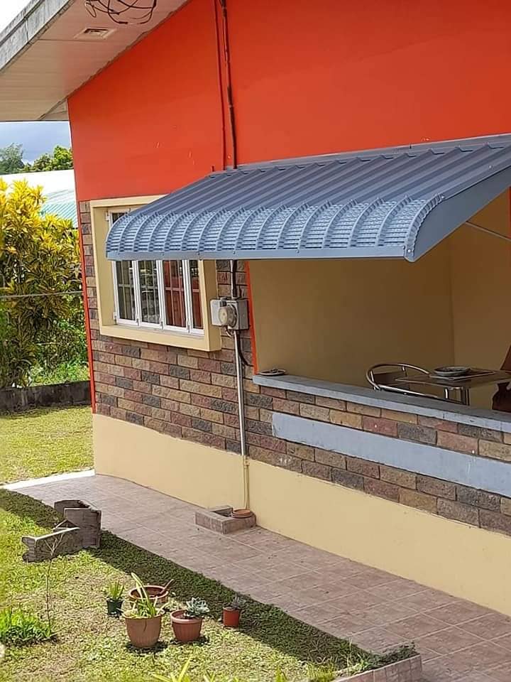 General Awnings - AWNINGS & CANOPIES