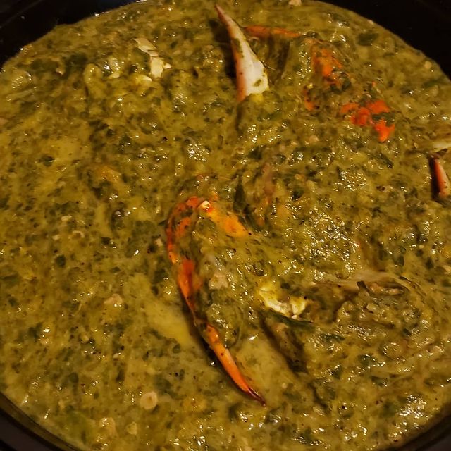 Cuisine Switch Trinidad Callaloo and Crab dish in a pot.