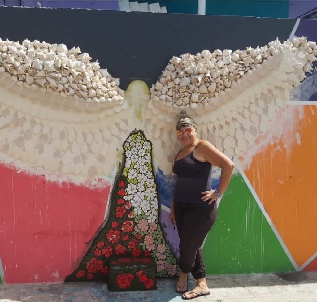 Caribbean Aesthetics articles on Aruban mosaic artist Omaira Silva with image of mosiac art Angel Wings