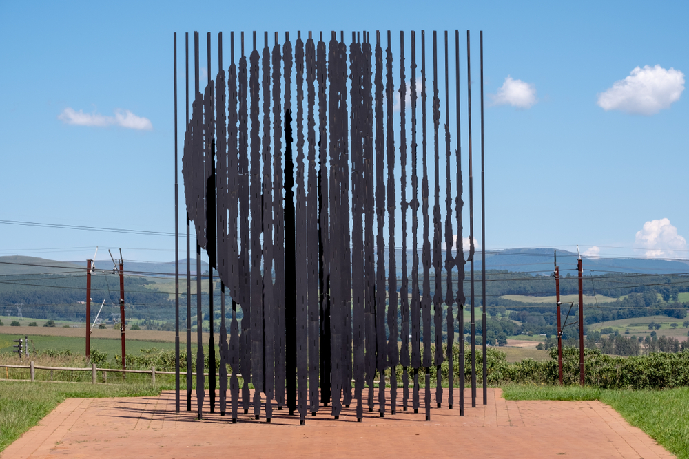 Findyello article on Nelson Mandela Day with image of South African President Nelson Mandela statue in wrought iron