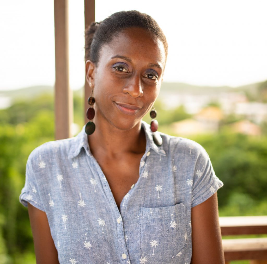 Findyello Caribbean Aesthetics article on Illustrated Grenada Fayola Edwards with photo of Fayola smiling