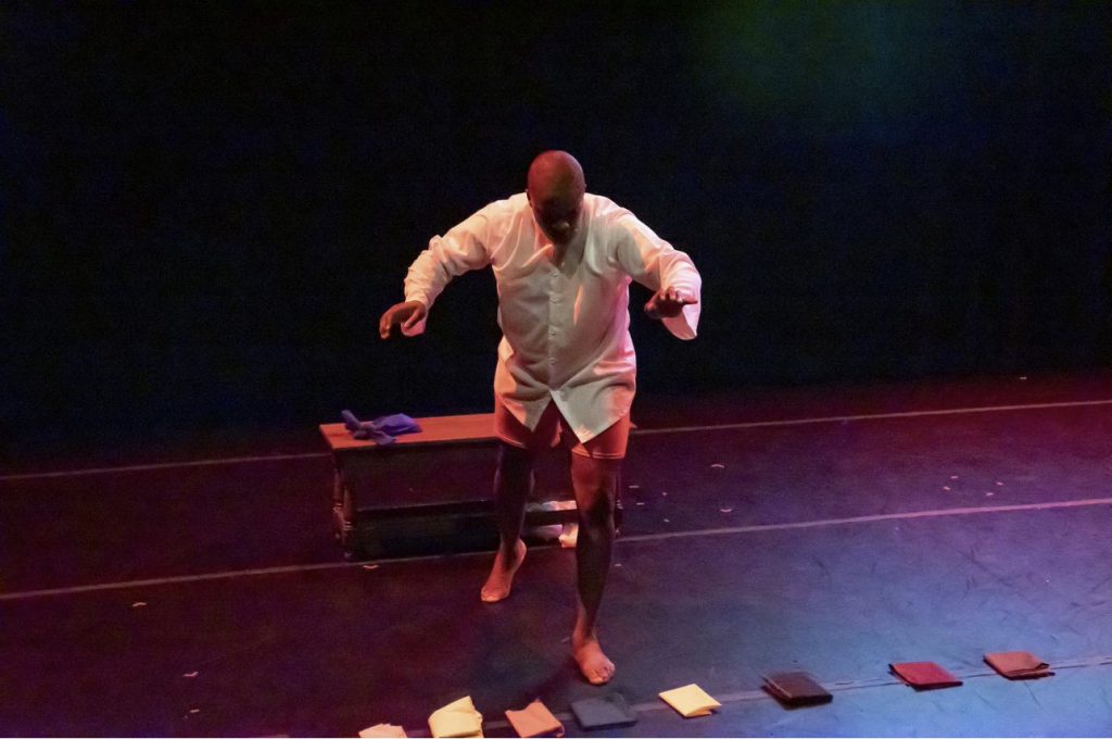 Findyello Caribbean Aesthetics article featuring dancer Kieron Sargeant with image of him performing on stage