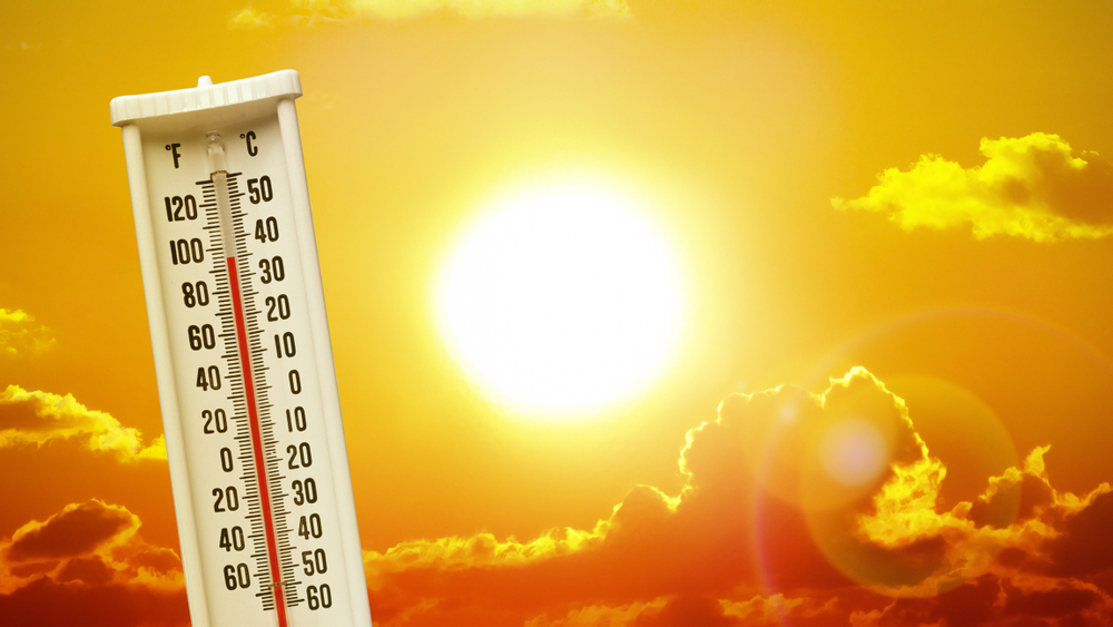 Findyello article sharing tips to beat the heat with image of scorching sun and thermometer showing high temperatures