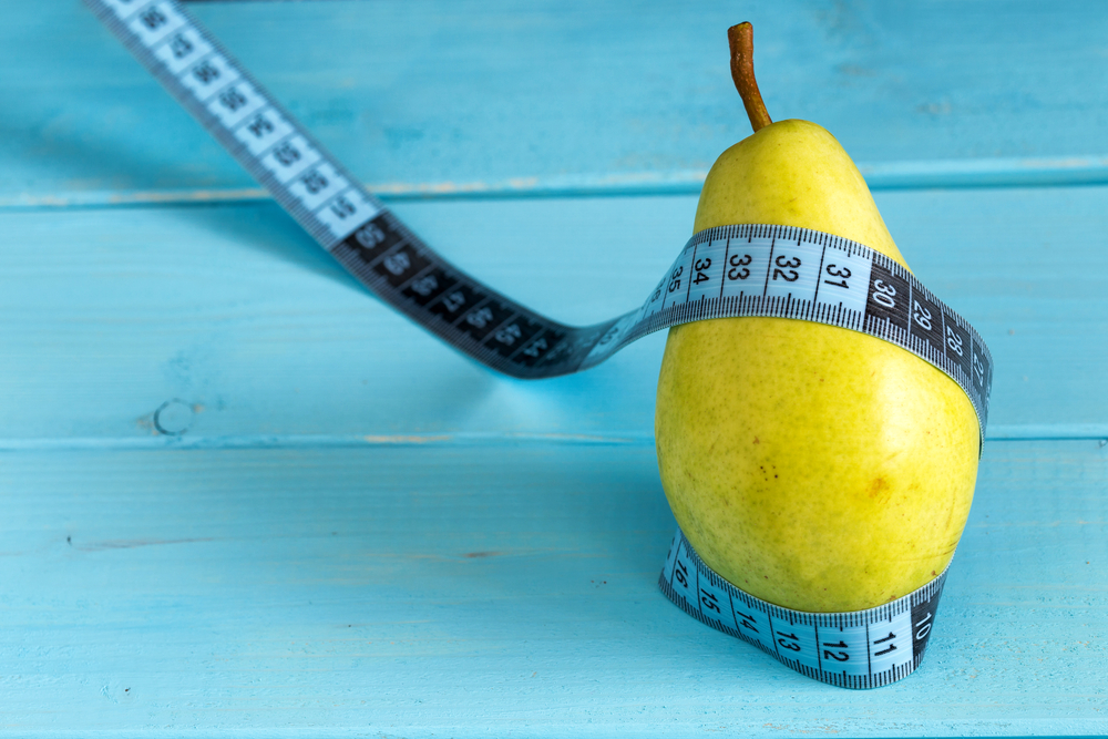 Findyello article on the caribbean woman body shapes with image of pear and measuring tape for pear-shaped figures