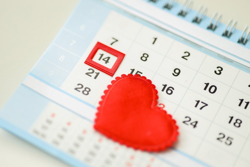 Findyello article on Valentine's Day tips for businesses with image of calendar with February 14 highlighted in red with a heart